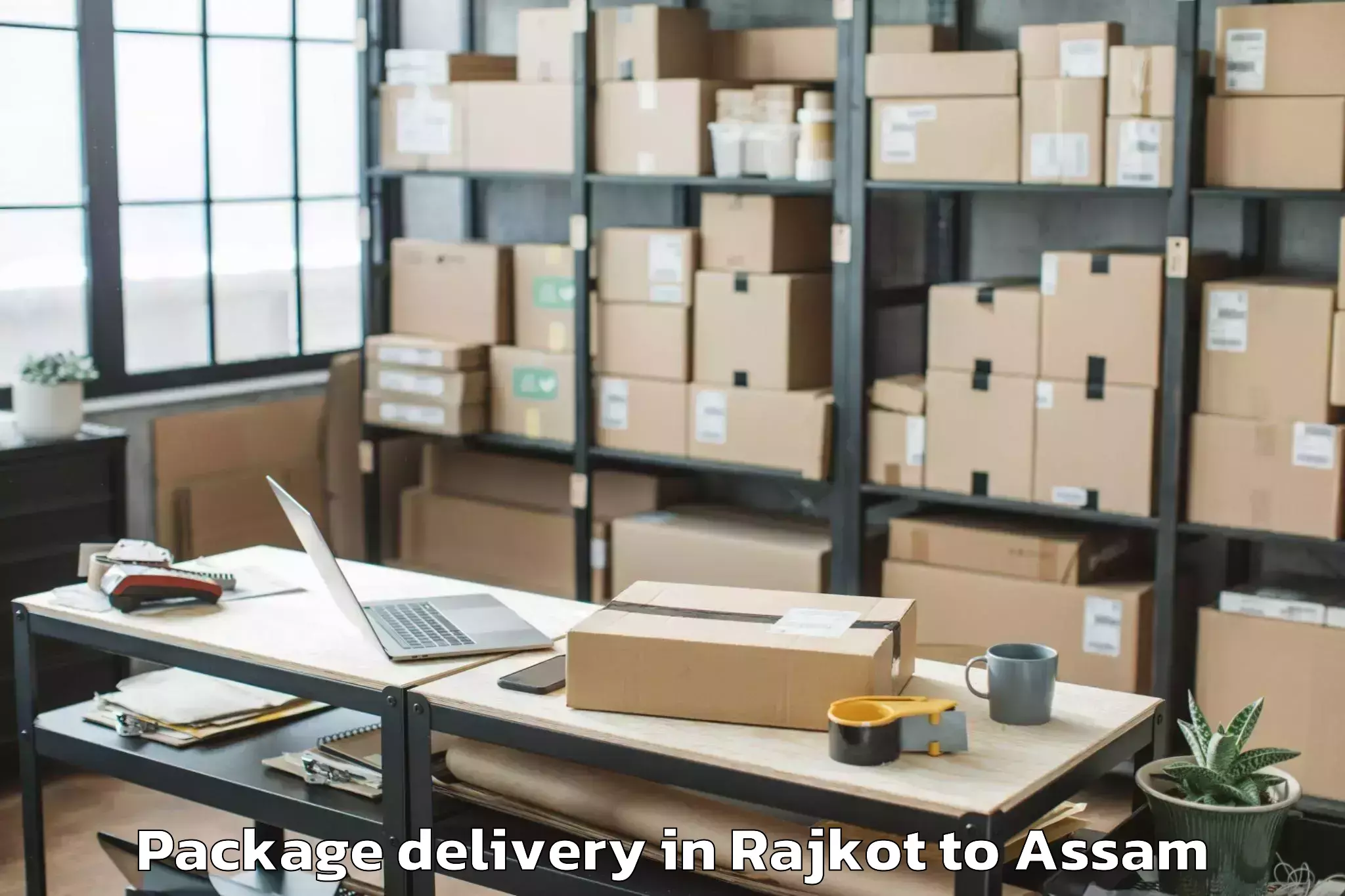 Affordable Rajkot to Raha Gaon Package Delivery